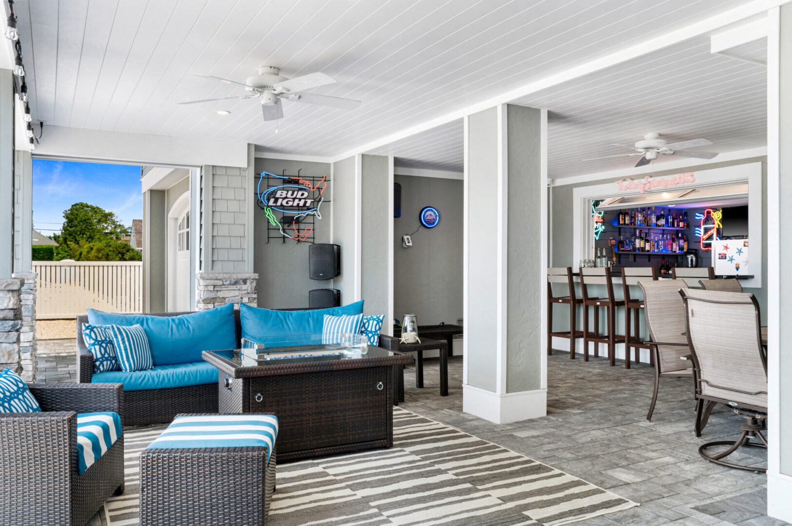 A living room with couches and tables in it