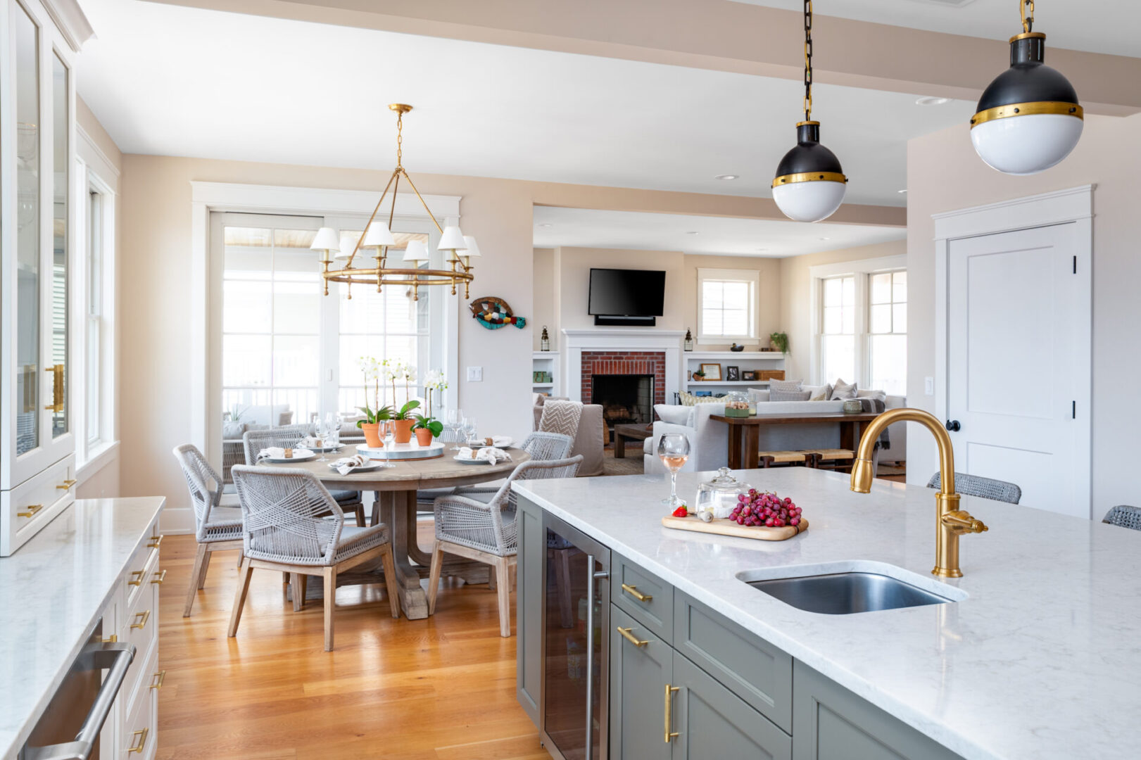 A kitchen with a dining room table and chairs.